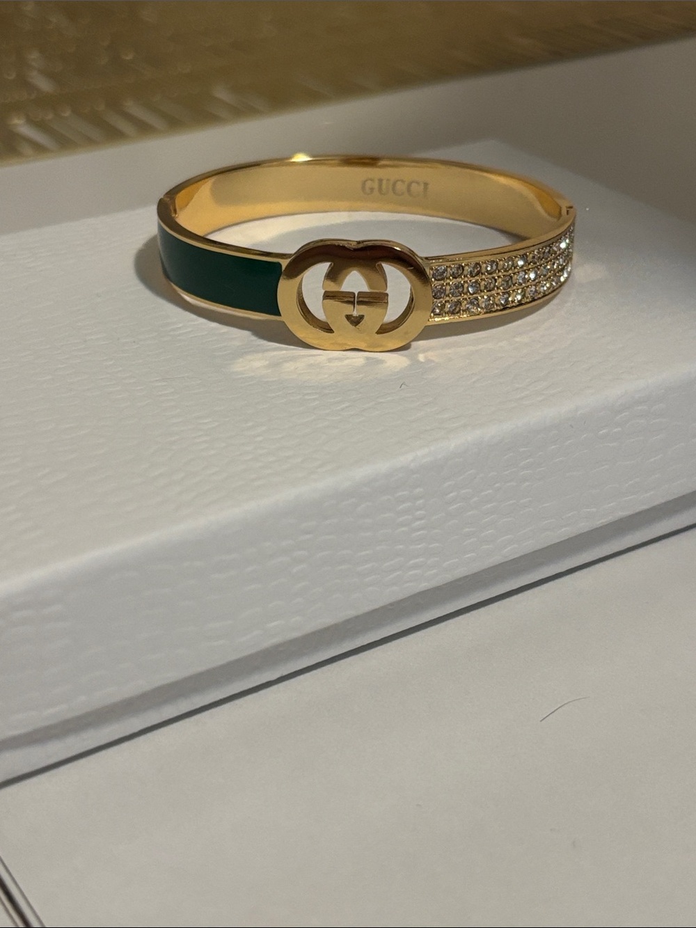 Fashion Jewelry Gold-Tone Green Enamel & Crystal Accent Logo Bangle